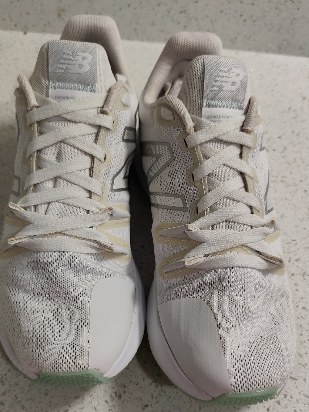 New Balance Men's Athletic Shoes in White with Light Gray and Cream Accents
